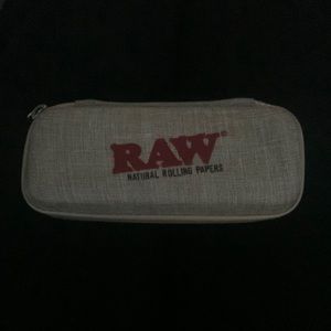 Raw smell proof rolled cigarettes holder like new, will hold cigars too